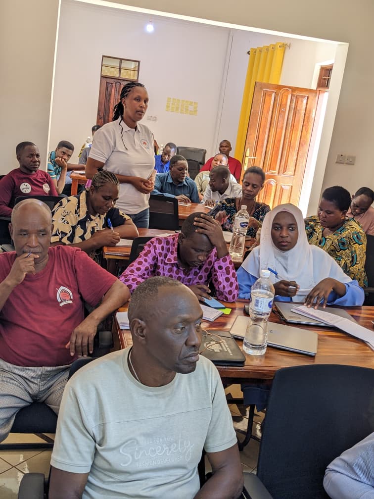 Training participants taking notes